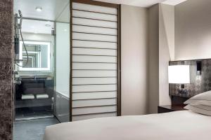 Postel nebo postele na pokoji v ubytování Hilton Tokyo Hotel