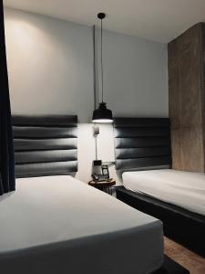 Postel nebo postele na pokoji v ubytování Apartahotel con Piscina