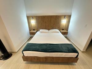 Postel nebo postele na pokoji v ubytování Amara404 Lindo apartaestudio tipo estudio en barrio Laureles con balcon