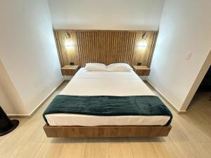 Postel nebo postele na pokoji v ubytování Amara404 Lindo apartaestudio tipo estudio en barrio Laureles con balcon