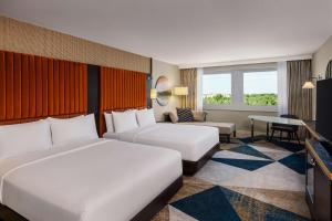 Hilton Vienna Waterfront客房内的一张或多张床位