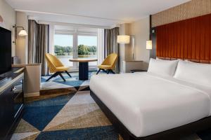 Hilton Vienna Waterfront客房内的一张或多张床位