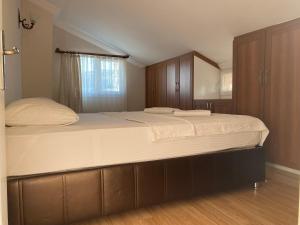 Postel nebo postele na pokoji v ubytování Cam Hotel