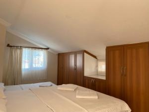 Postel nebo postele na pokoji v ubytování Cam Hotel
