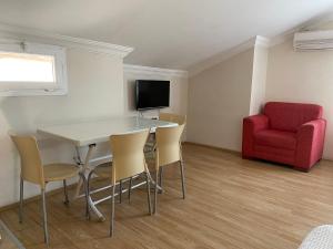 TV a/nebo společenská místnost v ubytování Cam Hotel
