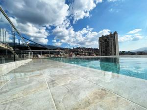 Bazén v ubytování Apartahotel con Piscina nebo v jeho okolí