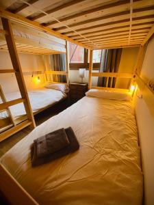 two bunk beds in a room with at Ochalet Bagergue in Bagergue
