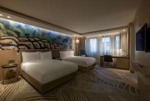 Postel nebo postele na pokoji v ubytování DoubleTree by Hilton Istanbul - Sirkeci + 37 fotografií