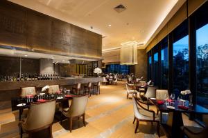 Area soggiorno di Hilton Wuhan Yangtze Riverside