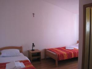 מיטה או מיטות בחדר ב-Rooms Sole