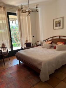 Postel nebo postele na pokoji v ubytování Casa Mimosa