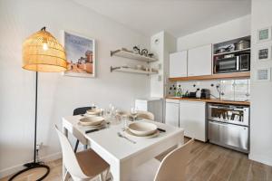 Kuchyň nebo kuchyňský kout v ubytování Le Coeur du Port Guillaume 4 pers