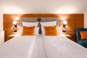 Postel nebo postele na pokoji v ubytování Terofal Hotel Schliersee - Komplett neu renoviert