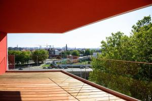 Rõdu või terrass majutusasutuses Hôtel Belvue
