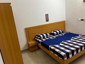 Una cama o camas en una habitación de Chadamou guest house
