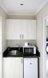 Dapur atau dapur kecil di Upstairs on One