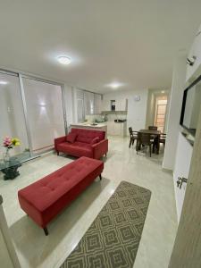 TV a/nebo společenská místnost v ubytování Perla del río habitaciones