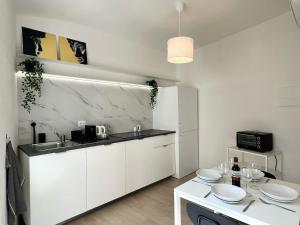 Kuchyň nebo kuchyňský kout v ubytování Florence Apartment 10 min dal centro-50 mt tram
