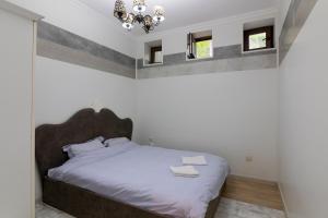 En eller flere senge i et værelse på Apartment Atlanta 1