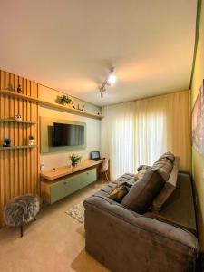 TV a/nebo společenská místnost v ubytování APARTAMENTO Completo 100 Metros PRAIA 19 Minutos BETO CARREIRO + 56 fotografií