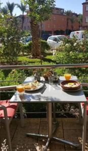 a table with two plates of food on it at JackRouivo in Marrakech