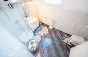 Koupelna v ubytování Apartment Bastaja + 35 fotografií