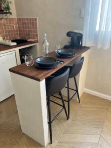 Η κουζίνα ή μικρή κουζίνα στο Studio cosy, piscine, parking, 5min plage, Arcachon +3 φωτογραφίες