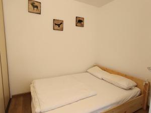 Posteľ alebo postele v izbe v ubytovaní Résidence Ferme D'augustin - Batiment D - Appartement "cosy" entièrement rénové, sur les pistes, balcon, parking. MAE-8834
