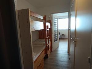 Posteľ alebo postele v izbe v ubytovaní Résidence Ferme D'augustin - Batiment D - Appartement "cosy" entièrement rénové, sur les pistes, balcon, parking. MAE-8834