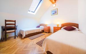 Postel nebo postele na pokoji v ubytování Apartment Bastaja