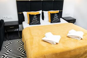 Posteľ alebo postele v izbe v ubytovaní Solne Apartamenty A247 z klimatyzacją Solny Resort