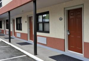 a row of doors on the side of a building at Maritime Inn Antigonish in Antigonish