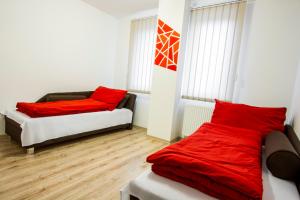 A bed or beds in a room at Sentami