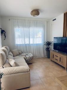 TV a/nebo společenská místnost v ubytování Sa Riera - Delta de l'Ebre + 26 fotografií