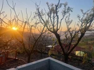 O nascer ou o pôr do sol visto a partir da casa de férias