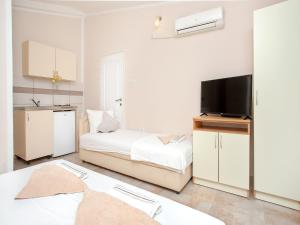 TV a/nebo společenská místnost v ubytování Apartments MIK5 - Famous Beach Jaz