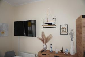 Telewizja i/lub zestaw kina domowego w obiekcie Studio Appartment Heinze