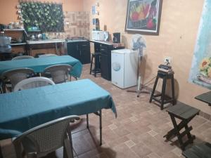 Kuchyň nebo kuchyňský kout v ubytování Nambí Rooms + 12 fotografií