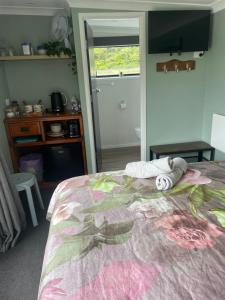 Fotografie z fotogalerie ubytování Robbies Hut v destinaci Greymouth + 8 fotografií