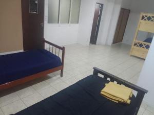 Postel nebo postele na pokoji v ubytování HOSTEL ARRAYAN BARILOCHE