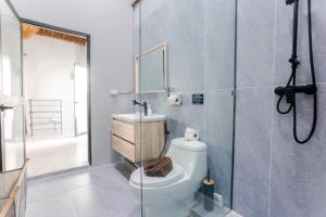 a bathroom with a toilet and a shower at Rocka Villa Maenam in Amphoe Koh Samui +64 photos