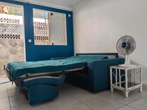 Letto o letti in una camera di Le cocotier bleu
