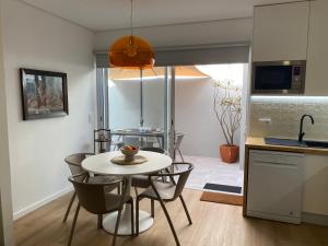 Køkken eller tekøkken på Casa do Lado - Vila Franca do Campo - AL