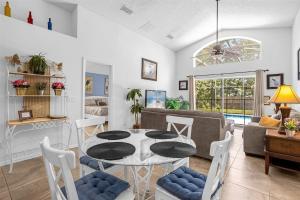 a living room with a table and a couch at 201-4-HB-Beautiful home at TerraVerde in Kissimmee