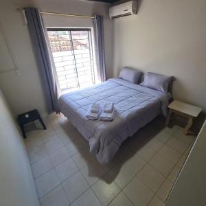 埃斯特城Quarto privado em casa com piscina compartilhada e a 6 minutos do centro da cidade的相册照片