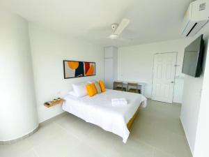 Voodi või voodid majutusasutuse Magico Apartaestudio con Piscina 1 Habitacion PR66C toas