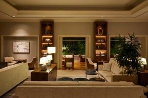 a living room with a couch and a table at Grand Nikko Tokyo Daiba in Tokyo