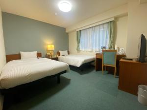 Postel nebo postele na pokoji v ubytování Hotel Tateshina + 37 fotografií