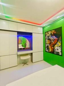 TV a/nebo společenská místnost v ubytování Cosy Nest Royal Oceancrest Mactan
