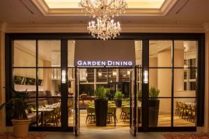 a restaurant with a sign that reads garden dining at Grand Nikko Tokyo Daiba in Tokyo